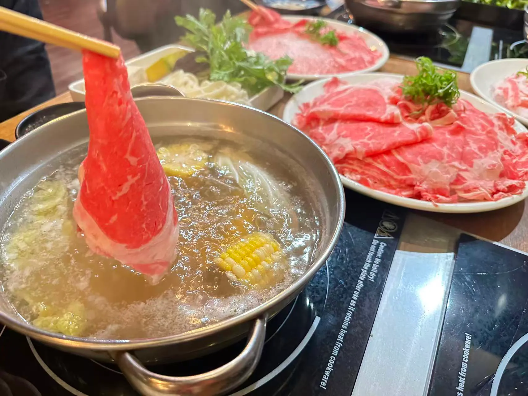 Wagyu beef slice cooked in hot pot broth at Shabubu, a Hot-Pot Restaurant in Arcadia